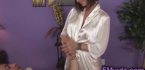 Cute masseuse Carie Ann plays with cock